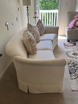 Curved Cream Upholstered Sofa