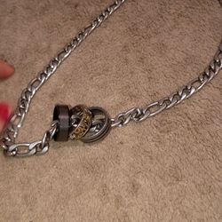 Stainless steel size 13 rings and necklace