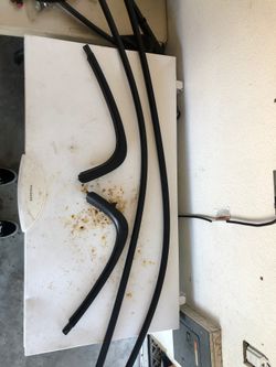 2006 BMW 325i Rain gutters