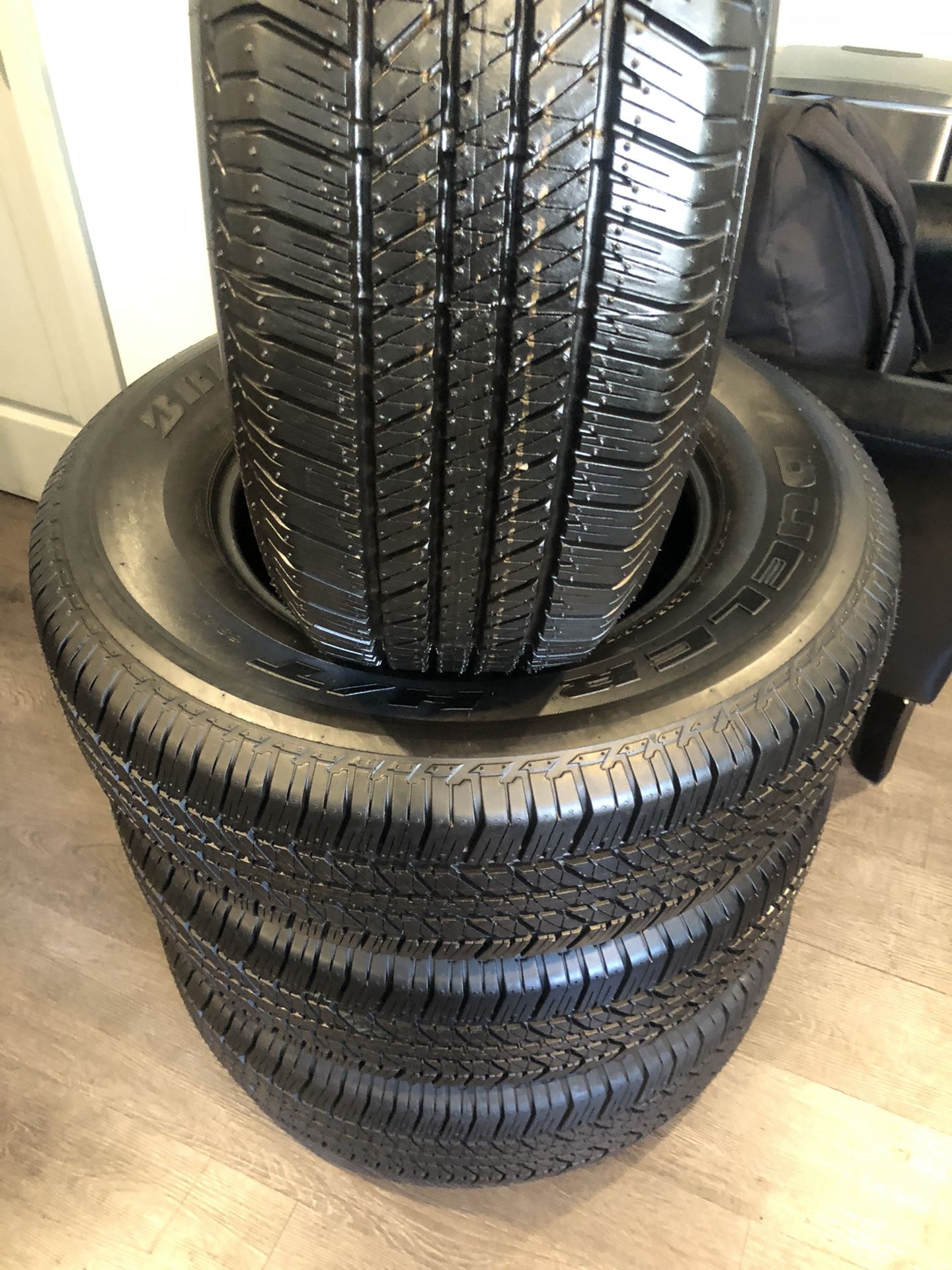SET OF FOUR TIRES 265/70/17 BRIDGESTONE DULER SEMI NEW 95%TREAD LIFE $300 PRICE INCLUDES PROFESSIONAL ISTALATION AND TAX