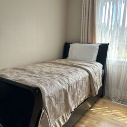 2 twin beds with mattresses and 1 dresser 
