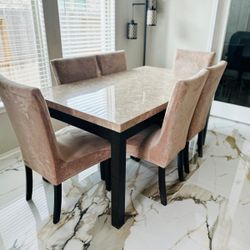 Selling a 7 piece marble Dining Room set.