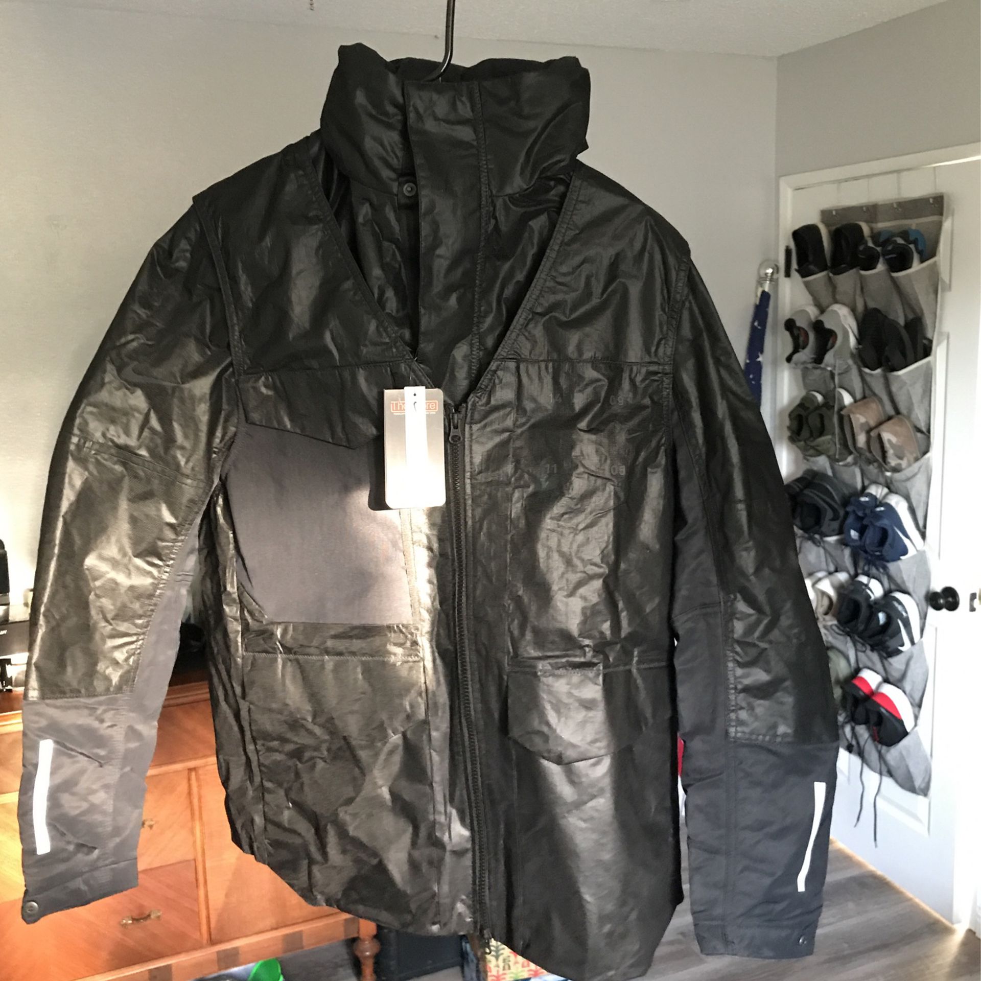 Nike (medium) Black with Removal Vest. It Has A Rain hidden hoody $160