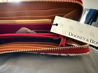 Dooney & Bourke wallet. With tags never used.