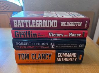 Books - Set of 4 Hardback Books - Clancy, Ludlum / Vak Lustbader, and W.E.B. Griffin