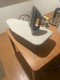 This Black & Decker steam iron is a 1200-watt model (ICR05X and ironing board
