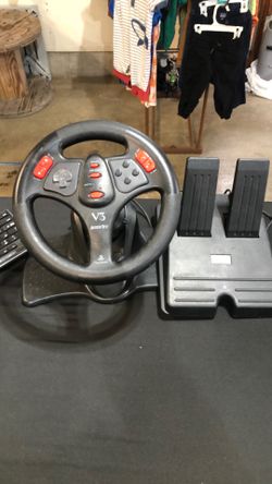 Vintage PlayStation, steering wheel and pedals