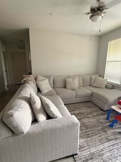 Ashley Furniture Larce 3-Piece Next-Gen Nuvella™ Performance Fabric Sectional with Chaise.