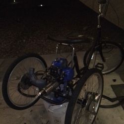 Motorized Bike And A Motorized Beach Cruiser Three Wheeler