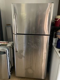 STAINLESS STEEL REFRIGERATOR FOR GARAGE OR SPARE, ICE COLD MISSING A SHELF 30” Wide 69” Height  34” Deep