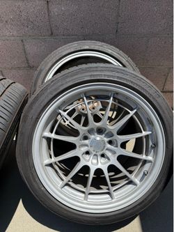 Enkei NT03+M 18x9.5 +40 5x114.3 Metallic silver Wheels
