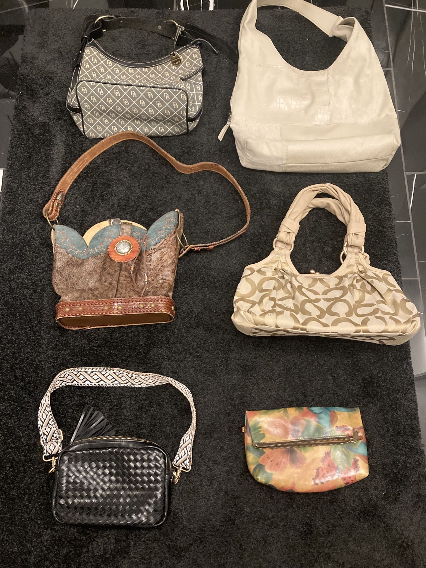 Set Of 17 Handbags In Good Condition, Coach, Steve Madden, pick up in Willowick. Sold as a set of Ten
