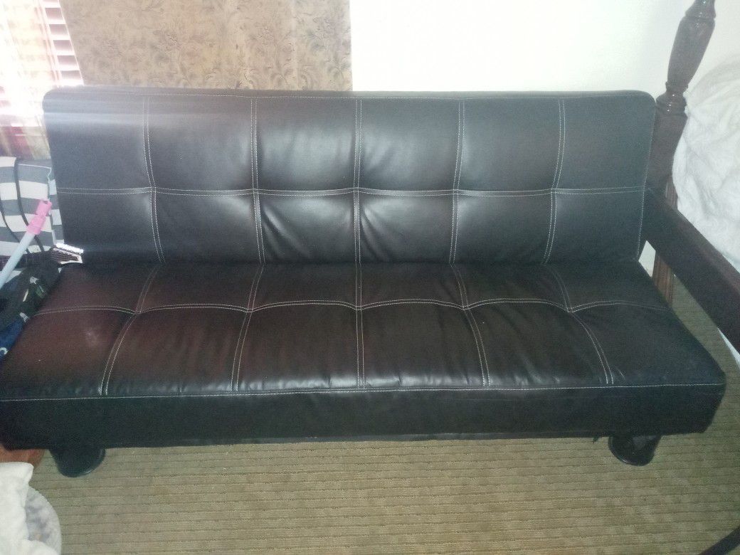 Leather futon great condition