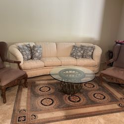 White sofa and 2 wing back chairs