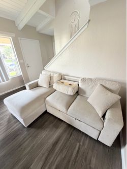 Multifunctional Beige Textured Sectional Sofa - Pull-out Bed, Storage & More!