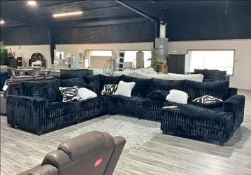 Large Black Plush Sectional Sofa with Ottoman $50 Down