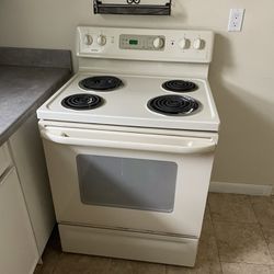 Multiple Electric Stoves And Refrigerators 