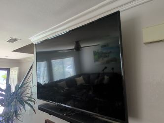 65" LG Flat Screen TV,  LG sound bar w/ Bluetooth subwoofer, and heavy duty TV mount