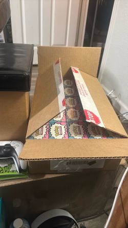 Ascended Heroes booster bundles and a sealed case