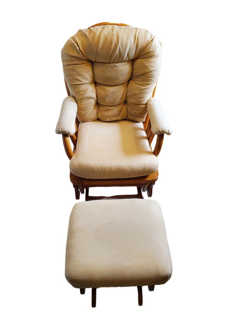 Glider rocking chair with an ottoman.
