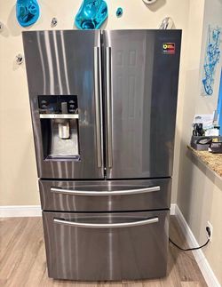 Samsung black stainless steel refrigerator