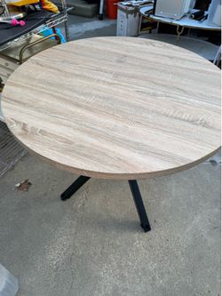 Round wooden dinning table