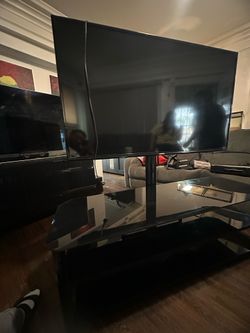 Samsung TV with TV stand