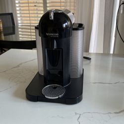 Nespresso Vertuoline machine in great condition works great .