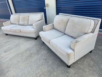Nailhead couch and loveseat