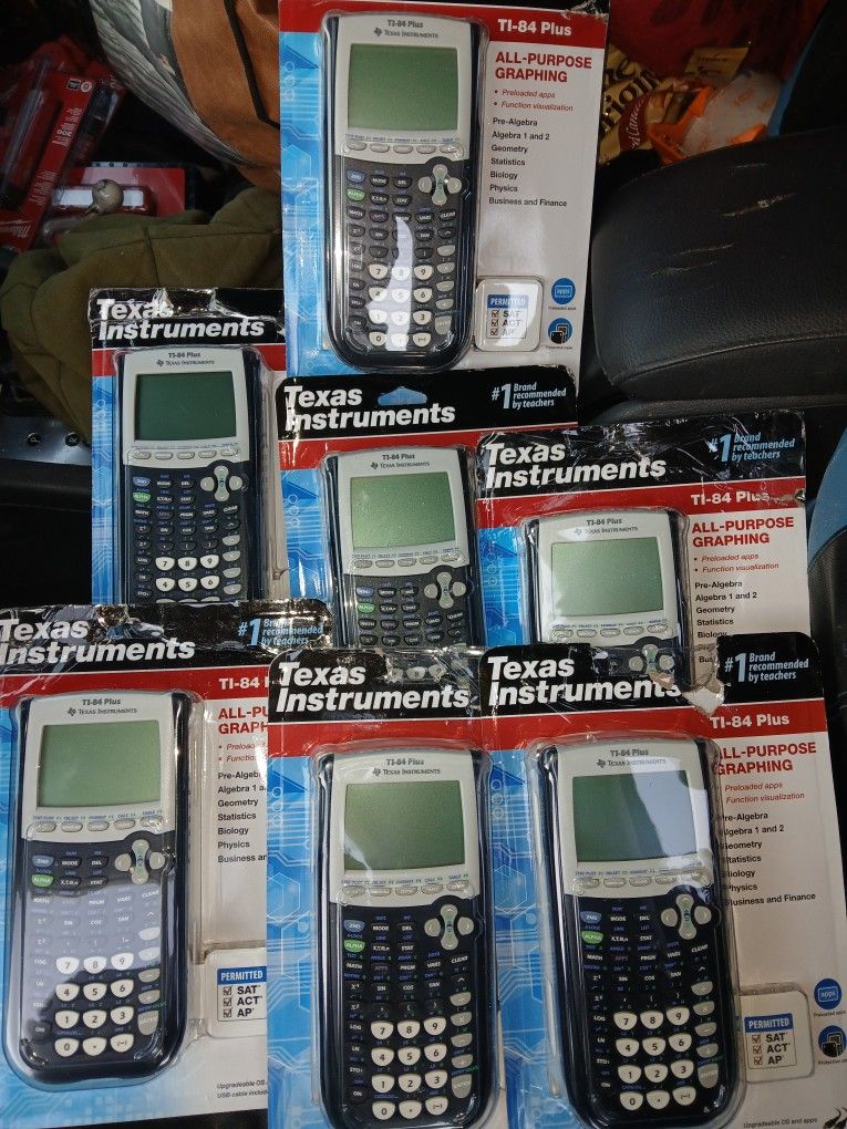 7 Texas Instruments TI-84 Plus Graphing Calculators