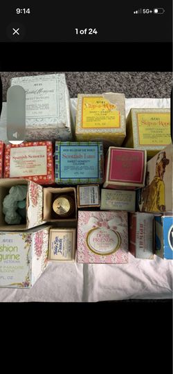 4 Large boxes of Avon perfume