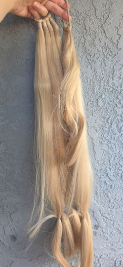 Long blonde hair extension