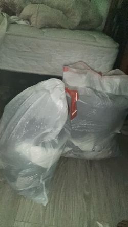 One full bag and half a full bag of women’s clothes
