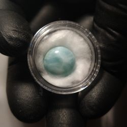 Natural Larimar Cabochon In Display 