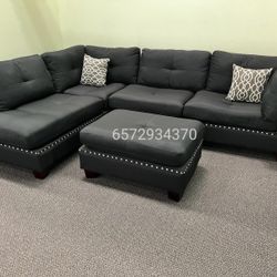 Reversible black sectional sofa 104x75 " includes ottoman