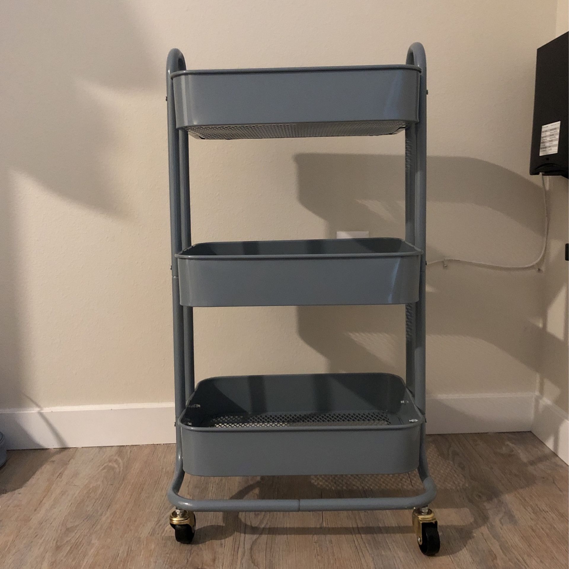 Blue 3-tiered utility cart, medium sized with wheels