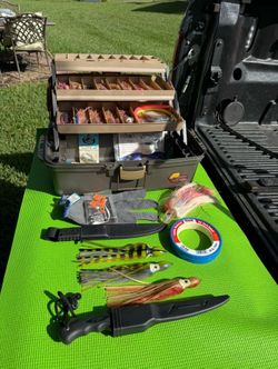 Tackle Box with Saltwater Fishing Lures and Fillet Knives