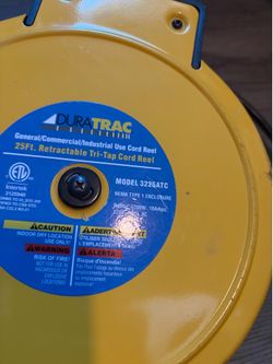 Duratrac retractable tri-tap cord reel