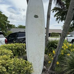 7.6. Ft Robert August "Corky Carroll" Longboard 