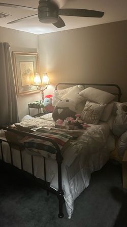 Victor black rod iron bed with mattress brand new