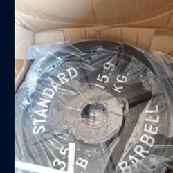 35 lbs Weight Plate. 2" Olympic NEW.  $ 40 per Plate