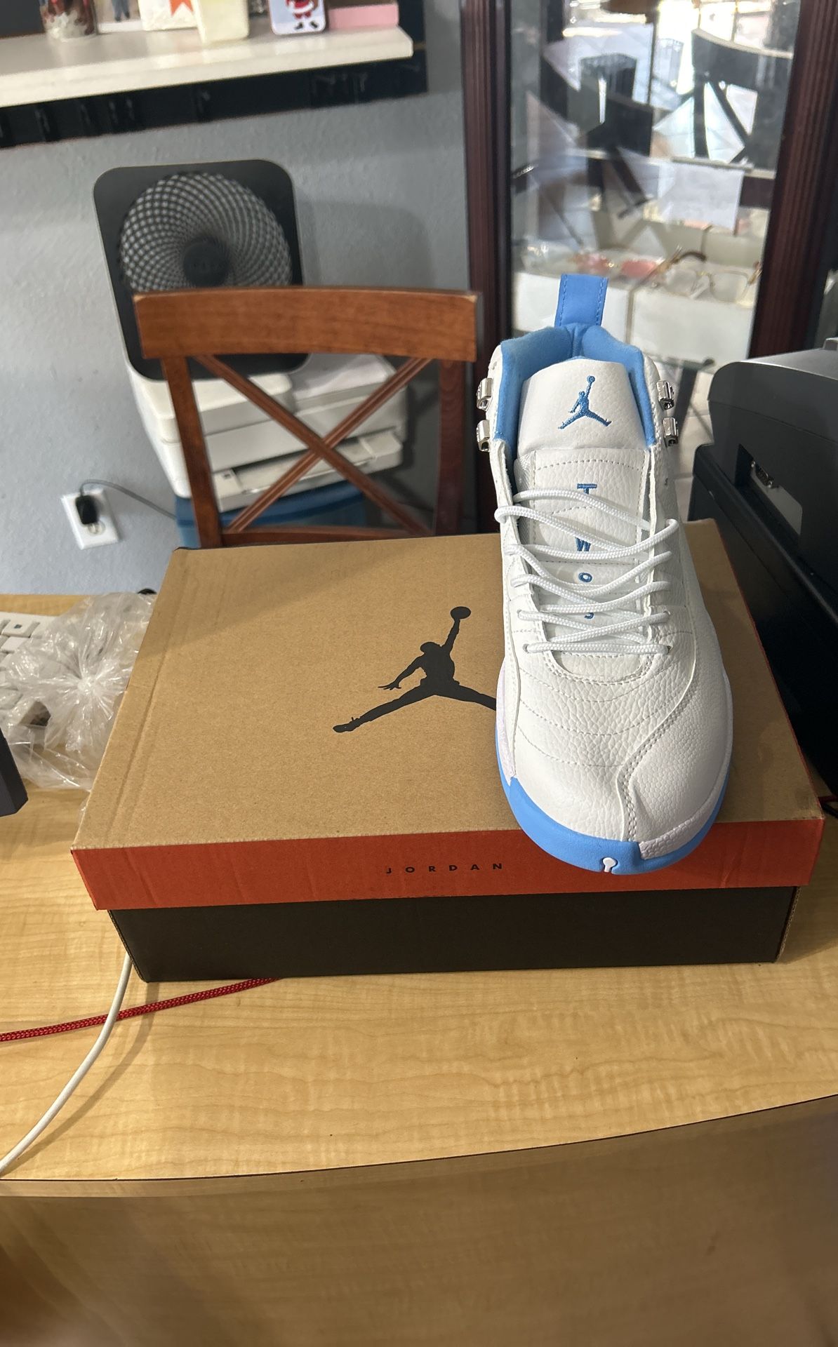 Jordan 12 Retro “White University Blue” (2004)