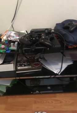 Xbox 360 plus 3 controllers and 2 mics