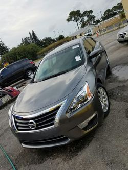 2015 nissan solo 37 millas por 4000 down payment