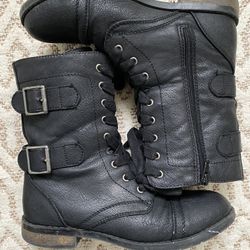 Woman’s Black Boots