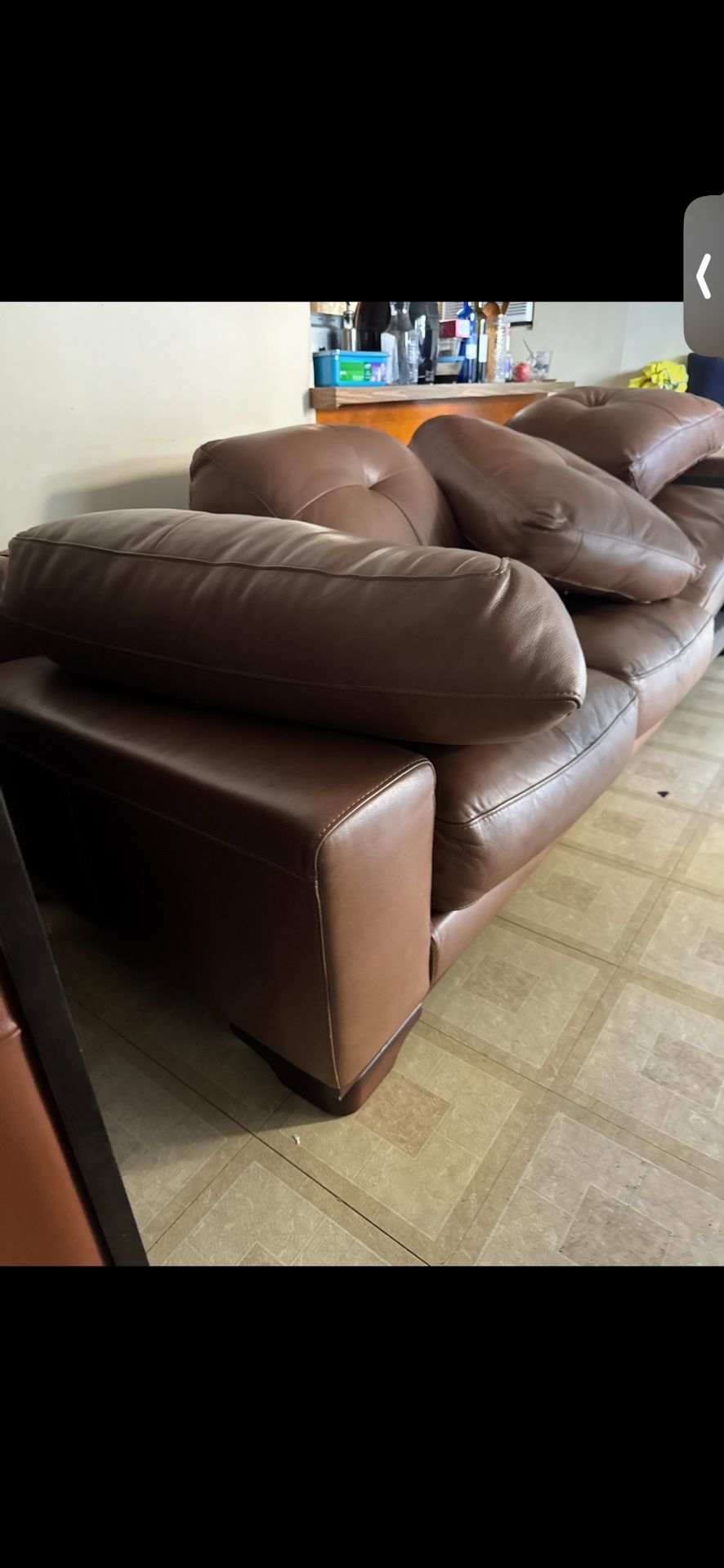 Free large, three seater couch with ottoman table