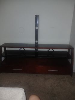 Tv stand like new no scratches or dents Asking 30 or best offer
