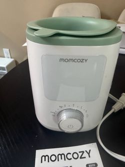 Momcozy bottle warmer like new