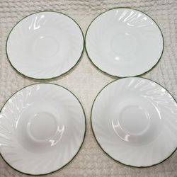Corelle 4 Swirl Chutney saucers 6"  white with green trim. Good condition and smoke free home. 