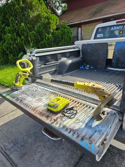 RYOBI  18 VOLT WEEDEATER  / BATTERY AND CHARGER